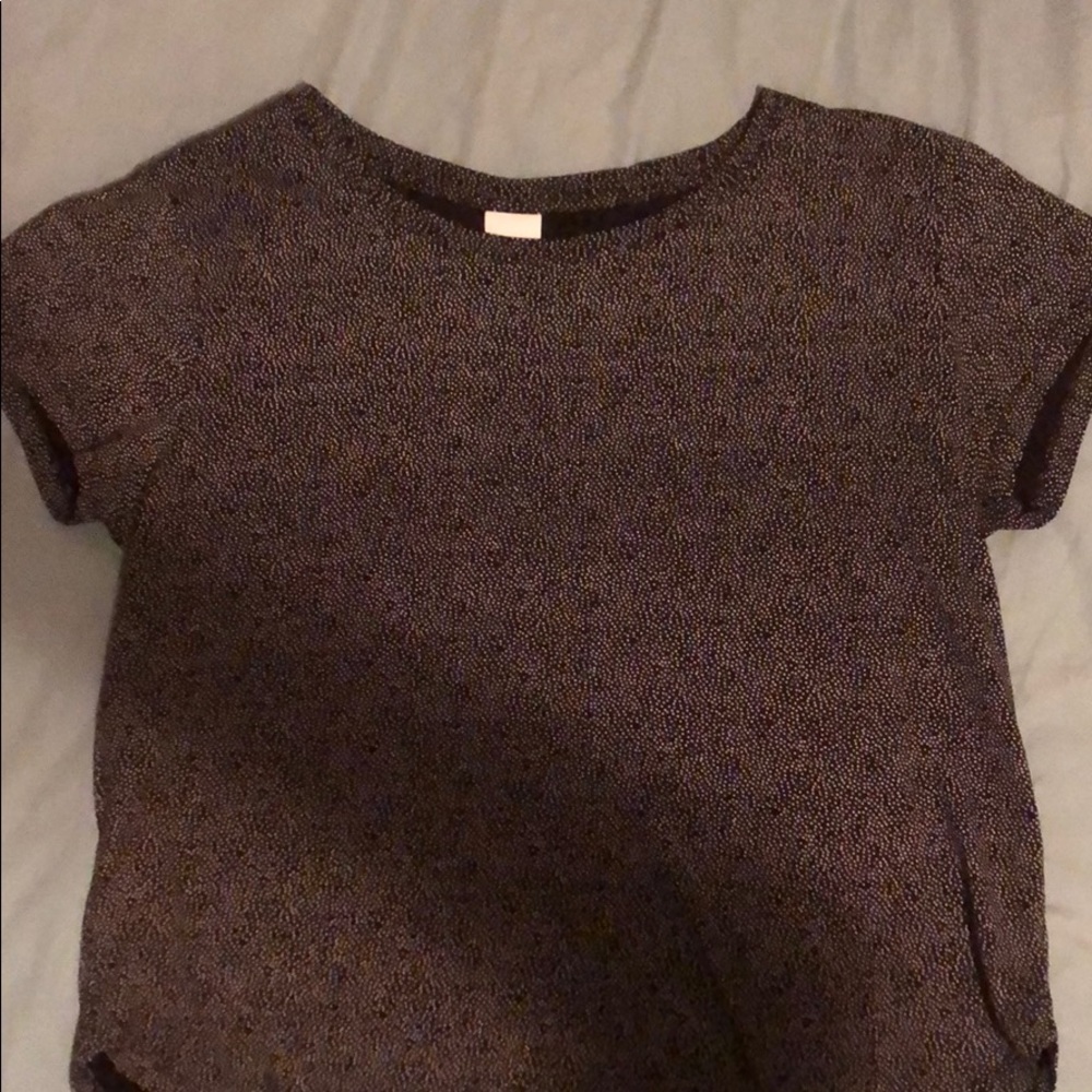 Black top with white polka dots